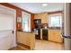Functional kitchen featuring warm wood cabinets, black appliances, and great natural lighting, ideal for cooking at 2507 9Th St, Boulder, CO 80304