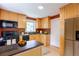 The kitchen is equipped with wooden cabinets, stainless steel appliances and a view out the window at 2507 9Th St, Boulder, CO 80304