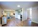 Basement living room with full kitchen, comfortable seating, and bright lighting at 2507 9Th St, Boulder, CO 80304