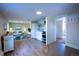Open-concept living room with modern white kitchen and seating area at 2507 9Th St, Boulder, CO 80304