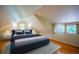 Cozy bedroom with sloped ceiling, carpet, natural light, and comfortable furnishings at 2507 9Th St, Boulder, CO 80304