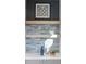 Stylish bar area features tile backsplash, floating shelves, and elegant decor, ideal for entertaining guests at 2538 S Acoma St, Denver, CO 80223