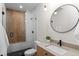 Modern bathroom with walk-in shower and sleek finishes at 2538 S Acoma St, Denver, CO 80223