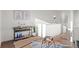 Cozy living space with stylish decor, including wood floors and modern furniture at 2538 S Acoma St, Denver, CO 80223