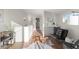 Bright living space with stylish decor, including wood floors and modern furniture at 2538 S Acoma St, Denver, CO 80223