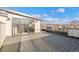 Large outdoor deck features sleek composite wood and city views at 2538 S Acoma St, Denver, CO 80223