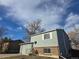 Charming two-story home featuring a brick foundation and vinyl siding at 4247 S Pitkin St, Aurora, CO 80013