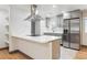 Contemporary kitchen with stainless appliances and quartz countertops at 1112-1112 1/2 Krameria St, Denver, CO 80220