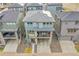 Aerial view of a two-story home with a balcony and solar panels at 15794 W Girard Ave, Morrison, CO 80465