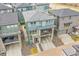 Aerial view of a two-story home with a balcony and solar panels at 15794 W Girard Ave, Morrison, CO 80465