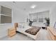 Bright bedroom with lots of light, exercise equipment, and minimalist decor at 15794 W Girard Ave, Morrison, CO 80465