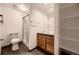 Full bathroom showcasing a glass-enclosed shower and modern fixtures at 7054 S Flower Ct, Littleton, CO 80128