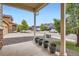 Inviting front porch with potted plants and views of the well-kept neighborhood street at 56579 E 23Rd Pl, Strasburg, CO 80136