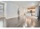 Spacious open-concept living area featuring modern finishes and hardwood flooring throughout at 4773 Kittredge St, Denver, CO 80239