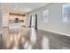 Inviting living area open to the kitchen, with ample natural light and patio access at 4773 Kittredge St, Denver, CO 80239