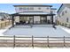 Spacious backyard with covered patio and ample space at 303 Rogers Ct, Castle Rock, CO 80104