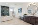 Large bathroom with tub, walk-in shower, modern vanity, and round mirror at 303 Rogers Ct, Castle Rock, CO 80104