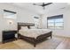 Bedroom with natural light, ceiling fan, and stylish decor at 303 Rogers Ct, Castle Rock, CO 80104