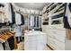 Well-organized walk-in closet with ample shelving and drawer space at 303 Rogers Ct, Castle Rock, CO 80104