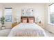 Comfortable bedroom with neutral tones and stylish decor at 757 Cabot Dr, Erie, CO 80516
