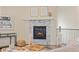 Close-up of a modern fireplace with stone surround at 757 Cabot Dr, Erie, CO 80516