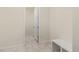 Hallway entrance featuring bench seating and tiled floors at 757 Cabot Dr, Erie, CO 80516