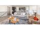 Open-concept living room with kitchen and dining area visible at 757 Cabot Dr, Erie, CO 80516