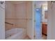 Full bathroom with tub and tiled walls at 1172 Juniper Ave, Boulder, CO 80304