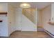 Bright entryway showcases hardwood floors, staircase, and classic overhead lighting at 1172 Juniper Ave, Boulder, CO 80304
