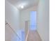 Well-lit hallway features neutral carpet, white walls, and access to other rooms at 1172 Juniper Ave, Boulder, CO 80304