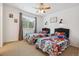 Bedroom featuring two twin beds with colorful Marvel themed comforters at 10969 Valleybrook Cir, Highlands Ranch, CO 80130