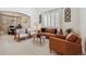 Elegant living room featuring modern decor, comfortable seating, and ample natural light at 10969 Valleybrook Cir, Highlands Ranch, CO 80130