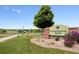 Sign for Paintbrush Park featuring lush landscaping, a walking path, and recreation area at 10969 Valleybrook Cir, Highlands Ranch, CO 80130
