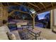 Inviting outdoor patio area with cozy seating and a grill, perfect for evening relaxation at 10969 Valleybrook Cir, Highlands Ranch, CO 80130