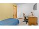 Bedroom features desk, chair and window with natural light at 1732 Lansing St, Aurora, CO 80010