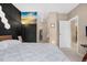 Well lit bedroom with bed, closet and decorative wall features at 6001 S Yosemite St # F207, Greenwood Village, CO 80111