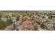 Lovely exterior view of Hermitage townhomes surrounded by beautiful trees and landscaping at 6001 S Yosemite St # F207, Greenwood Village, CO 80111