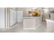 Open floor plan allows for this kitchen to have great flow with breakfast bar at 6001 S Yosemite St # F207, Greenwood Village, CO 80111