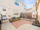 Backyard patio with a privacy fence, brickwork, and a lovely fountain feature at 7323 Lowell Blvd, Westminster, CO 80030