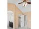 This is a view of the carpeted bedroom that flows into the closet and bathroom at 7323 Lowell Blvd, Westminster, CO 80030