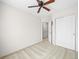 Clean bedroom featuring neutral walls, carpeted floors, and a closet at 7323 Lowell Blvd, Westminster, CO 80030