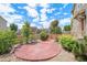 Beautiful backyard with stamped concrete patio, rock garden and lush landscaping at 13326 Olive Way, Thornton, CO 80602