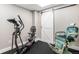 Basement with workout equipment and barber chair at 13326 Olive Way, Thornton, CO 80602
