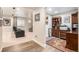 Basement featuring sitting area and an office space with built-in bookshelves at 13326 Olive Way, Thornton, CO 80602