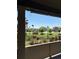 View from the porch showcasing the neighborhood's green space and well-maintained homes at 13326 Olive Way, Thornton, CO 80602