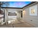 View of covered patio and detached garage at 5231 Quitman St, Denver, CO 80212