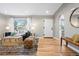 Bright living room with archways, hardwood floors, and stylish decor at 5231 Quitman St, Denver, CO 80212