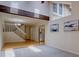 Inviting living area with staircase, stainless steel appliances, and open floor plan at 11867 Elk Head Range Rd, Littleton, CO 80127
