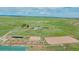 Panoramic aerial view of sprawling horse property including home and riding facilities at 27115 County Road 13, Elizabeth, CO 80107