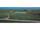Aerial view of horse property showcasing multiple arenas and large stable at 27115 County Road 13, Elizabeth, CO 80107